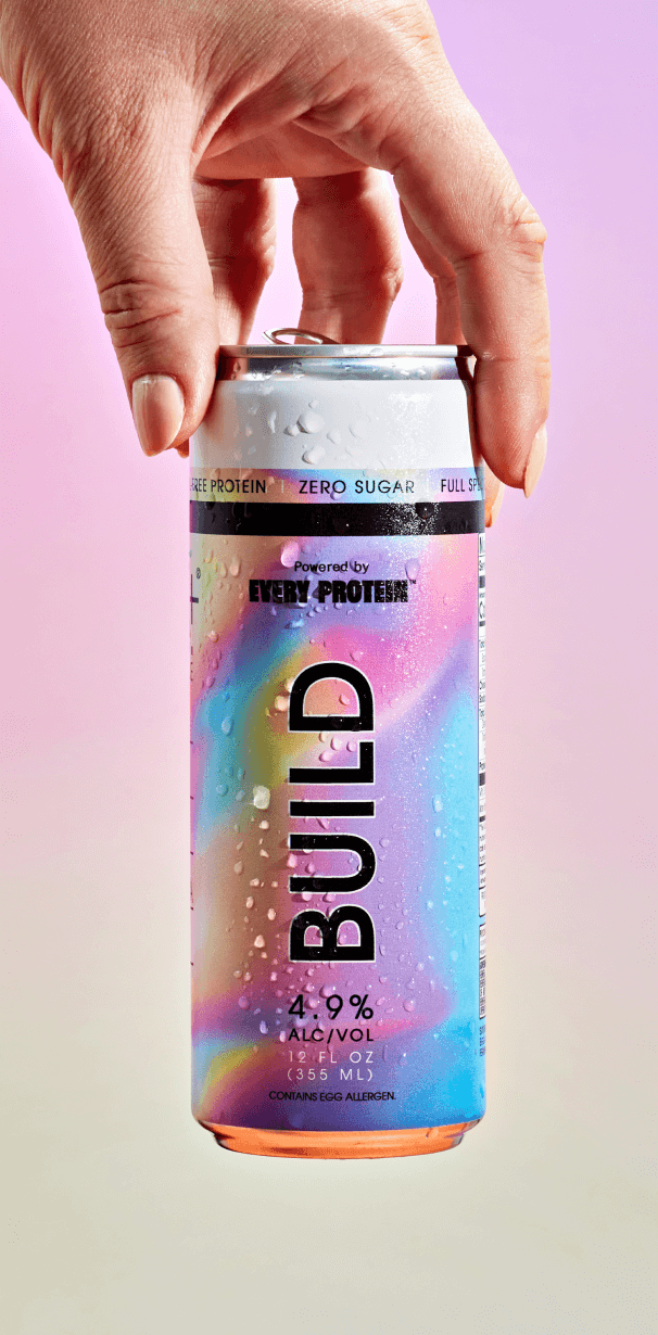 Person holding BUILD can